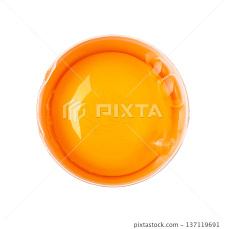 Raw egg yolk in cracked shell top view Raw egg yolk in cracked shell top view 137119691