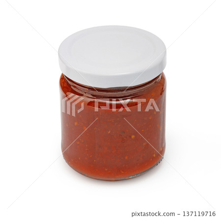 Glass jar filled with red preserving homemade food 137119716