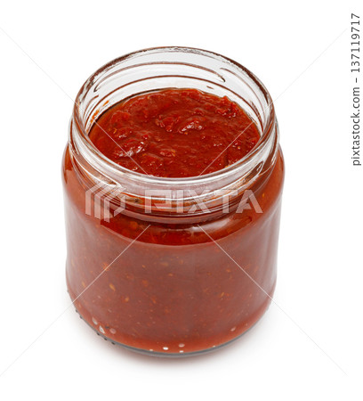 Glass jar filled with fresh red tomato salsa Glass jar filled with fresh red tomato salsa 137119717