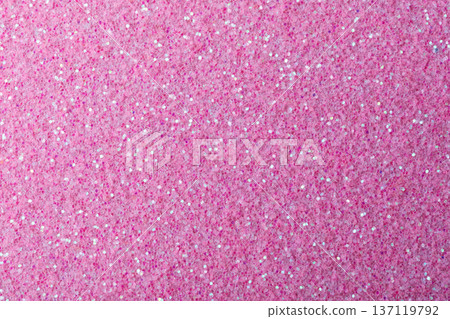 Pink glitter creating a shiny shimmering abstract texture backdrop 137119792