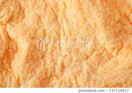 Orange fluffy textile surface creating abstract texture background 137119817