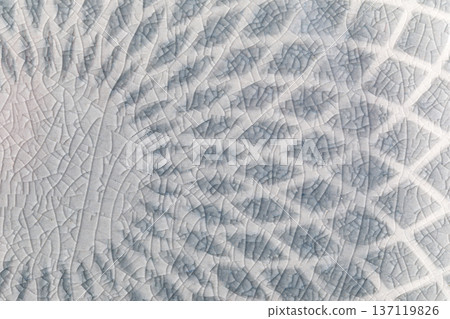 Cracked ceramic celadon glaze close up texture Cracked ceramic celadon glaze close up texture 137119826
