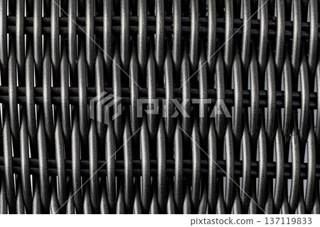 Black synthetic rattan weave pattern background texture Black synthetic rattan weave pattern background texture 137119833