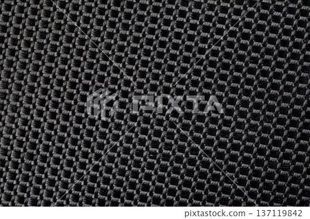 Black woven synthetic fabric macro texture background Black woven synthetic fabric macro texture background 137119842