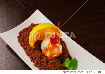 A delicious dessert with a scoop of chocolate sand 137120383