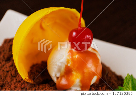 A delicious dessert with a scoop of chocolate sand A delicious dessert with a scoop of chocolate sand 137120395