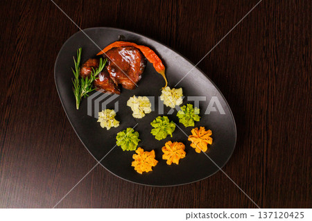 Fried meat on a plate with different sauces and Fried meat on a plate with different sauces and 137120425