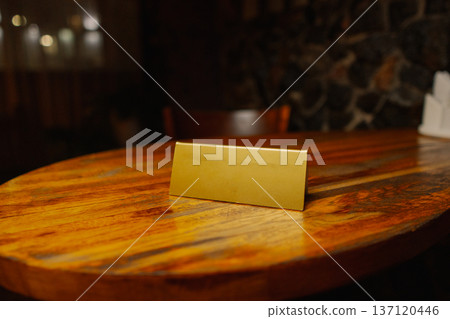 A sign without an inscription on the table A sign without an inscription on the table 137120446