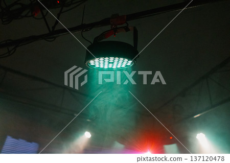 A multi-colored lantern hangs from the ceiling of A multi-colored lantern hangs from the ceiling of 137120478