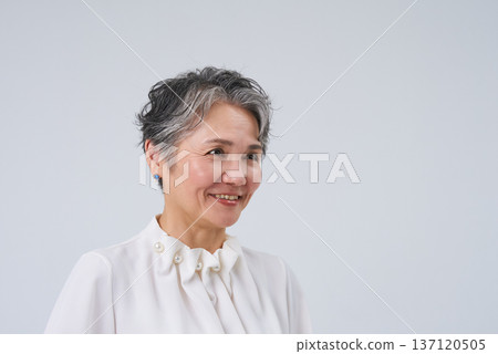 A smiling and energetic senior woman 137120505