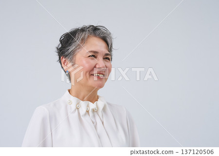 A smiling and energetic senior woman A smiling and energetic senior woman 137120506