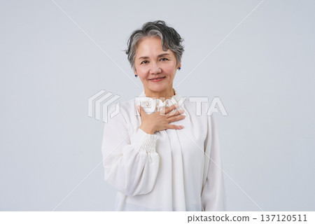 A smiling and energetic senior woman A smiling and energetic senior woman 137120511