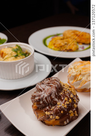 Several dishes for one person on the table Several dishes for one person on the table 137120572