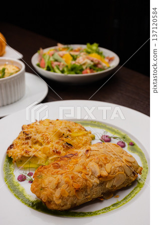 Several dishes for one person on the table 137120584