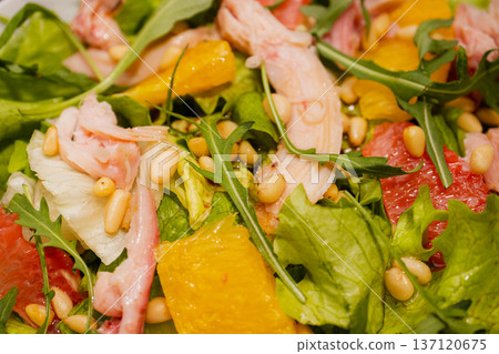 Chicken salad with grapefruit greens on a plate Chicken salad with grapefruit greens on a plate 137120675