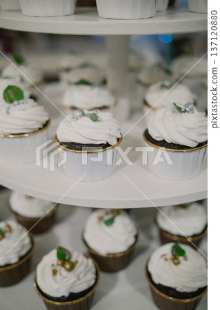 Beautiful wedding cake with several tiers Beautiful wedding cake with several tiers 137120880