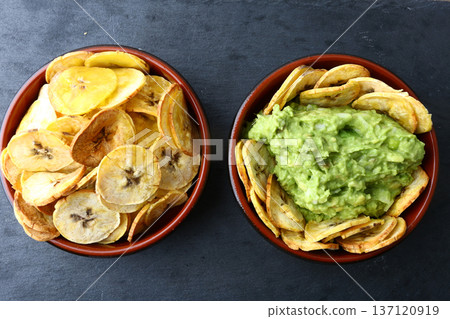 Plantain Patacones with Guacamole Dip Plantain Patacones with Guacamole Dip 137120919