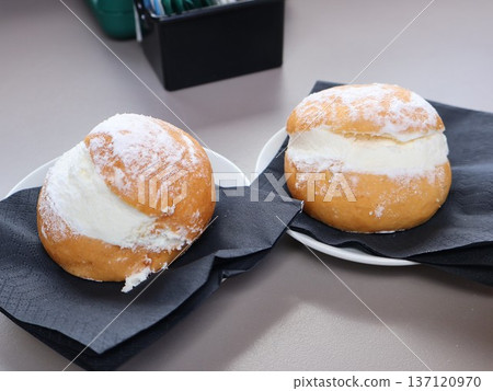 Maritozzo Italian Roman traditional Cream Bun Dessert on Plate Close Up 137120970
