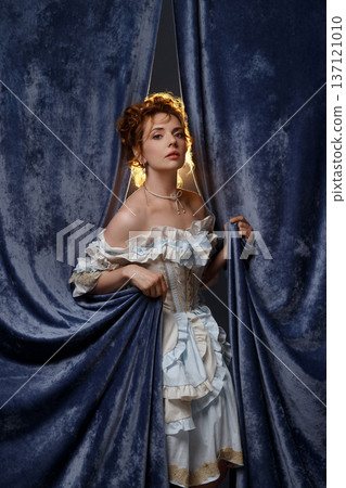 Elegantly Poised Performer Prepared Behind Velvet Curtain For Anticipated Stage Debut Elegantly Poised Performer Prepared Behind Velvet Curtain For Anticipated Stage Debut 137121010