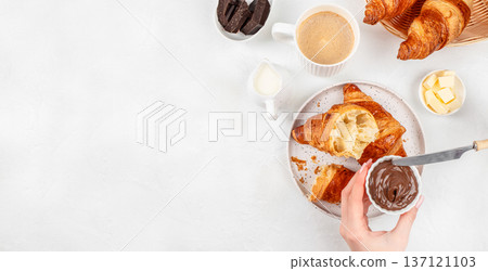 Top View Croissant with Chocolate Spread and Coffee Breakfast 137121103