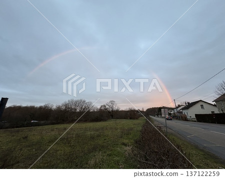A rainbow and suburban scenery at sunrise in Le Creusot, France 137122259