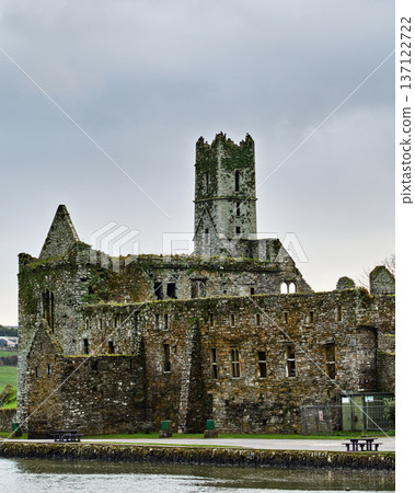 Timoleague Friary. Ancient stone monastery ruins. Historical Irish abbey. Ruins of a religious building. Exterior of an aged, abandoned stone monastery. 137122722