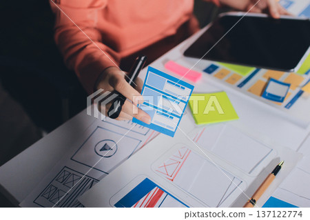 team of UI UX web designer are working together to develop mobile responsive websites with UI UX front end designer previews team of UI UX web designer are working together to develop mobile responsive websites with UI UX front end designer previews 137122774