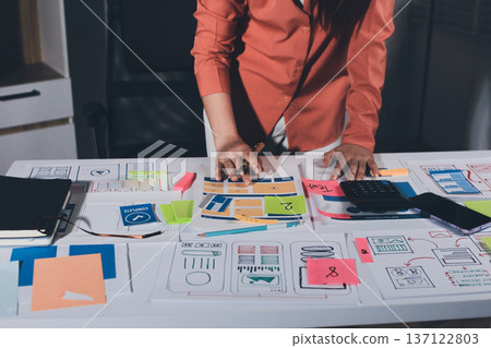 team of UI UX web designer are working together to develop mobile responsive websites with UI UX front end designer previews team of UI UX web designer are working together to develop mobile responsive websites with UI UX front end designer previews 137122803