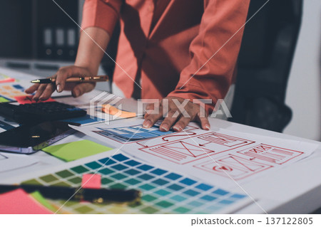 team of UI UX web designer are working together to develop mobile responsive websites with UI UX front end designer previews team of UI UX web designer are working together to develop mobile responsive websites with UI UX front end designer previews 137122805