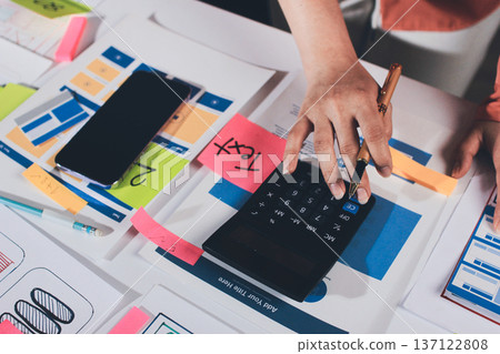 team of UI UX web designer are working together to develop mobile responsive websites with UI UX front end designer previews 137122808