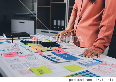 team of UI UX web designer are working together to develop mobile responsive websites with UI UX front end designer previews team of UI UX web designer are working together to develop mobile responsive websites with UI UX front end designer previews 137122814