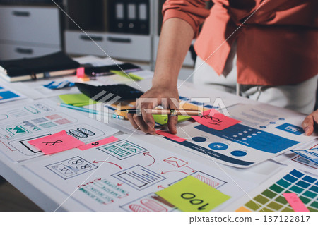 team of UI UX web designer are working together to develop mobile responsive websites with UI UX front end designer previews team of UI UX web designer are working together to develop mobile responsive websites with UI UX front end designer previews 137122817
