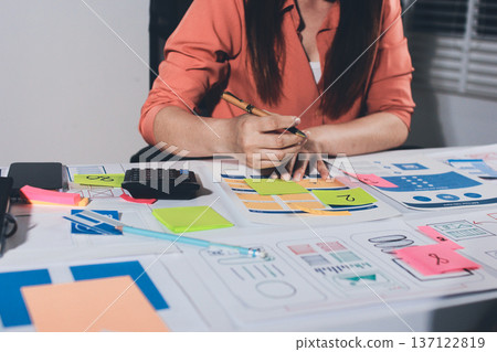 team of UI UX web designer are working together to develop mobile responsive websites with UI UX front end designer previews team of UI UX web designer are working together to develop mobile responsive websites with UI UX front end designer previews 137122819