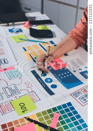 team of UI UX web designer are working together to develop mobile responsive websites with UI UX front end designer previews team of UI UX web designer are working together to develop mobile responsive websites with UI UX front end designer previews 137122831