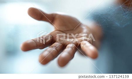 Businessman extending hand with superimposed network graphic, symbolizing global connection, communication, and technological advancement in business 137124139