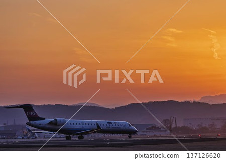 Sendai Airport at dusk: Sunset and taxiing planes, Natori City, Miyagi Prefecture 137126620