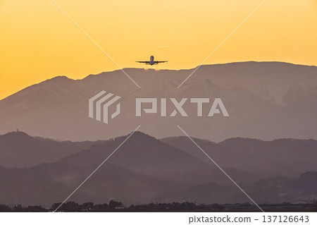 Sendai Airport at dusk: Sunset and planes taking off, Natori City, Miyagi Prefecture Sendai Airport at dusk: Sunset and planes taking off, Natori City, Miyagi Prefecture 137126643