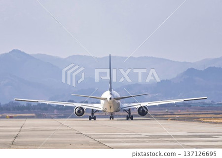 Sendai Airport in winter, airplane taxiing, Natori City, Miyagi Prefecture 137126695
