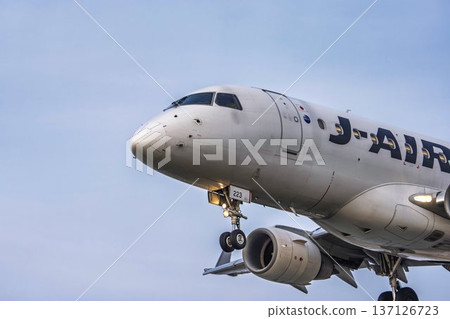 Sendai Airport at dusk, airplane landing, Natori City, Miyagi Prefecture Sendai Airport at dusk, airplane landing, Natori City, Miyagi Prefecture 137126723