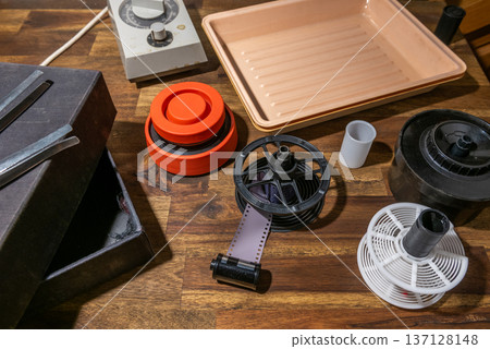 Equipment for analog photography, developing tray and film roll. Equipment for analog photography, developing tray and film roll. 137128148