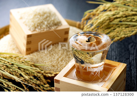 Rice and sake in a wooden box Rice and sake in a wooden box 137128300