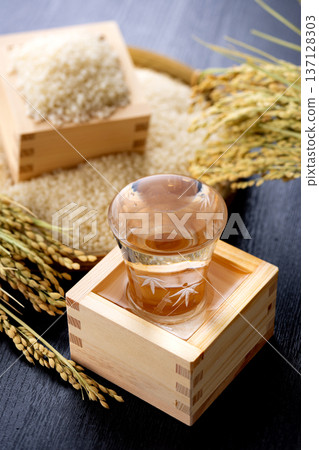 Rice and sake in a wooden box Rice and sake in a wooden box 137128303