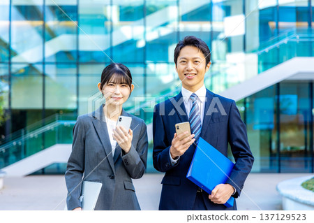 Business people standing in an office building 137129523
