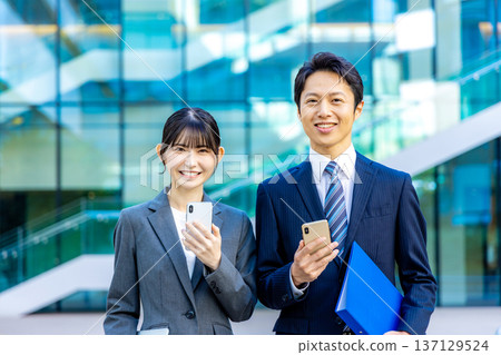 Business people standing in an office building 137129524