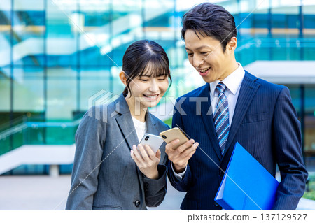 Business people standing in an office building 137129527