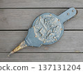 Antique bellows used for stoking the fire. Charming tool blends functionality with classic craftsmanship 137131204