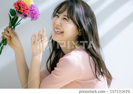 A woman with flowers 137131670