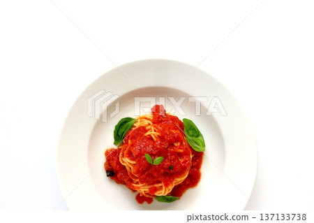 Tomato pasta on a white background viewed from directly above Tomato pasta on a white background viewed from directly above 137133738