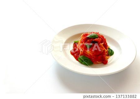 Tomato pasta on white background 137133882