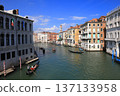 Gondolas on the canals of Venice and historic streets 137133958